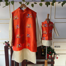 Load image into Gallery viewer, BT2372 Father-Son Matching Orange Embroidered Nehru Jacket with Cream Kurta Pajama – Festive &amp; Wedding Outfit Set
